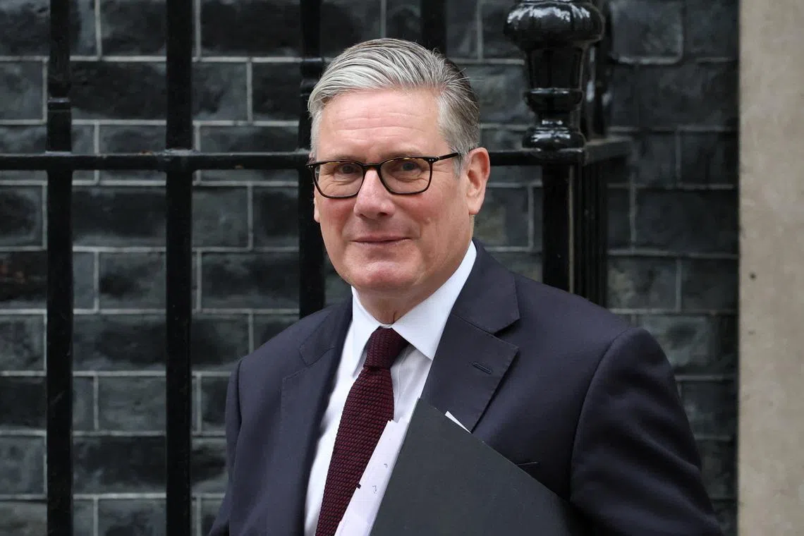 British Prime Minister Keir Starmer walks outside 10 Downing Street in London, Britain, July 1, 2026. REUTERS/Isabel Infantes