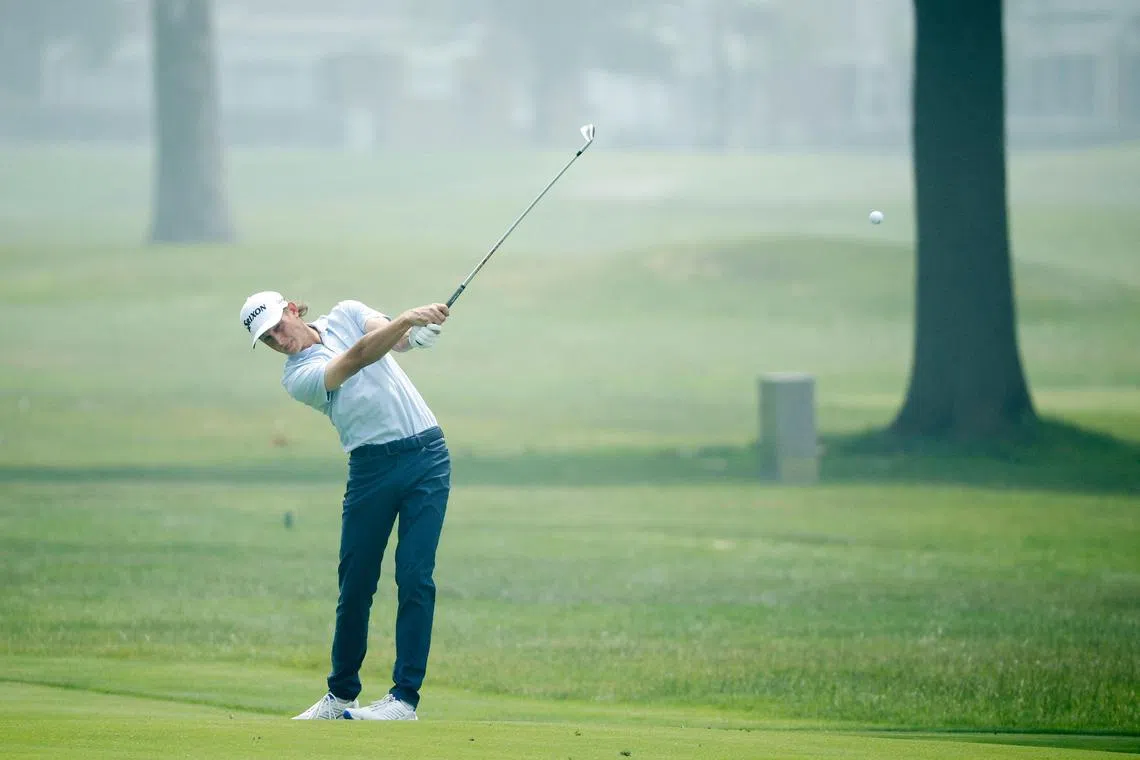 Peter Kuest of the United States plays his second shot on the 17th hole during the first round of the Rocket Mortgage Classic at Detroit Golf Club.