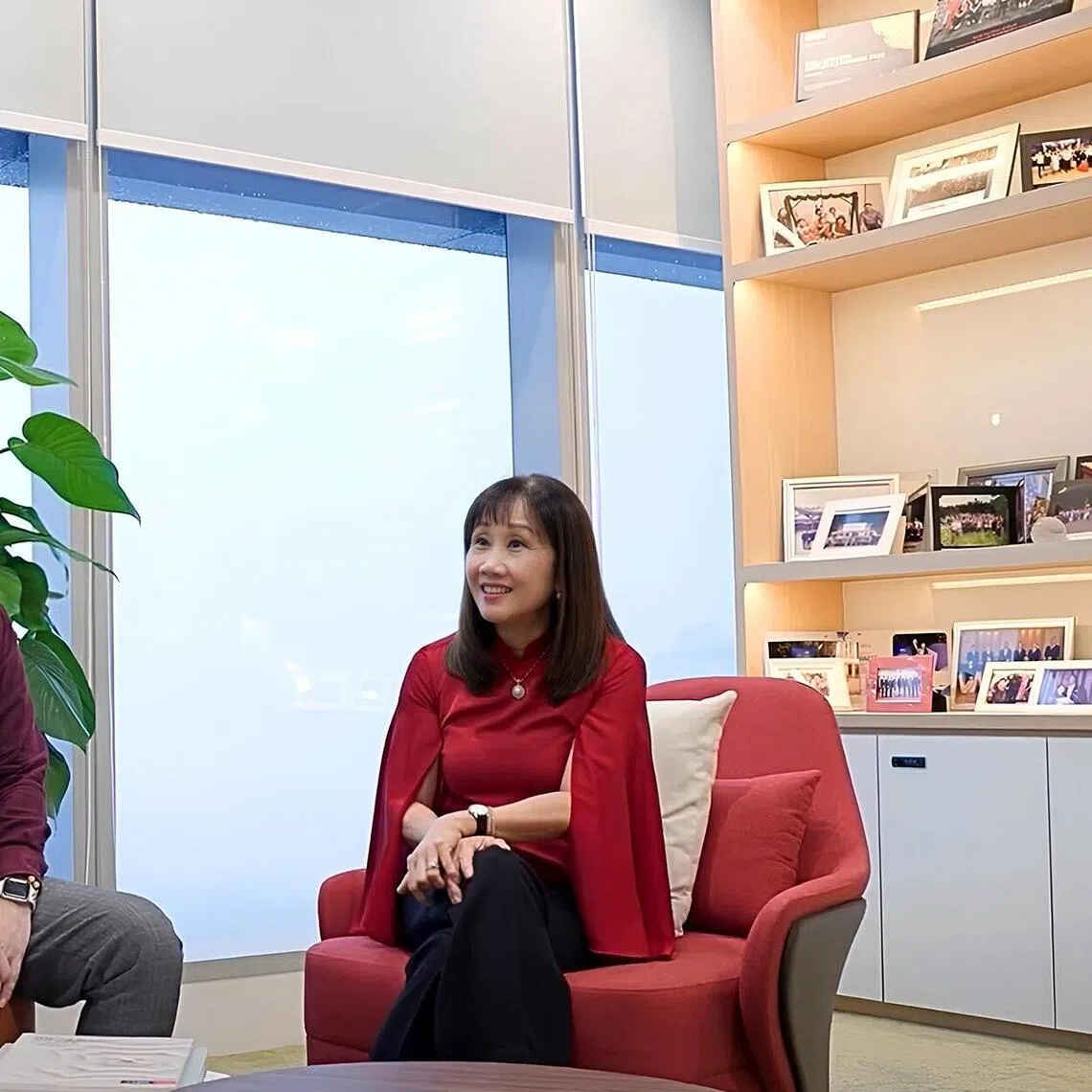 DBS Head of Group Human Resources Lee Yan Hong (right) says AI is less a crisis, and more a leadership opportunity. 