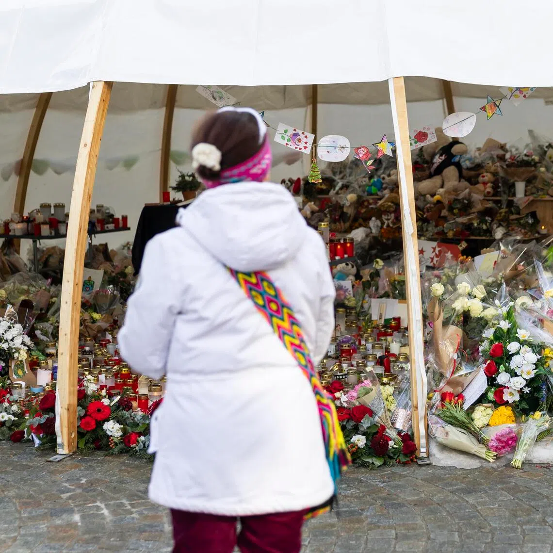 An informal memorial in Crans-Montana, Switzerland, for the 40 people who died in a New Year bar fire.