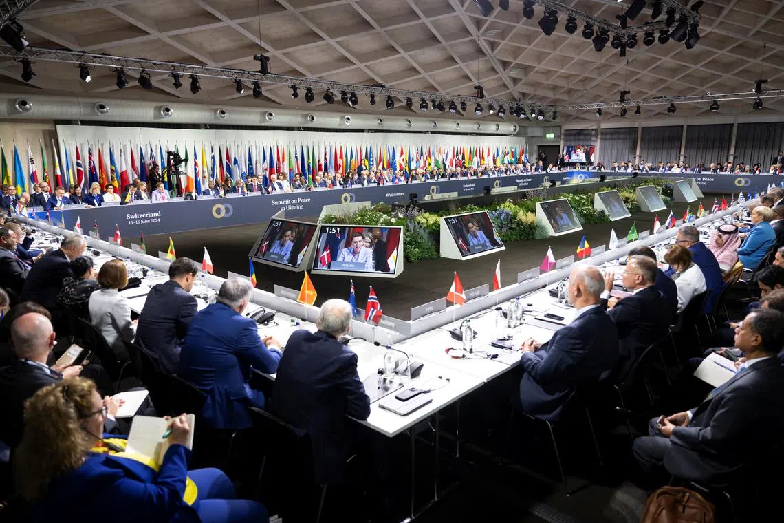 Participants listen to a speech during the opening plenary session, at the Summit on peace in Ukraine, in Stansstad near Lucerne, Switzerland, June 15, 2024. Urs Flueeler/Pool via REUTERS