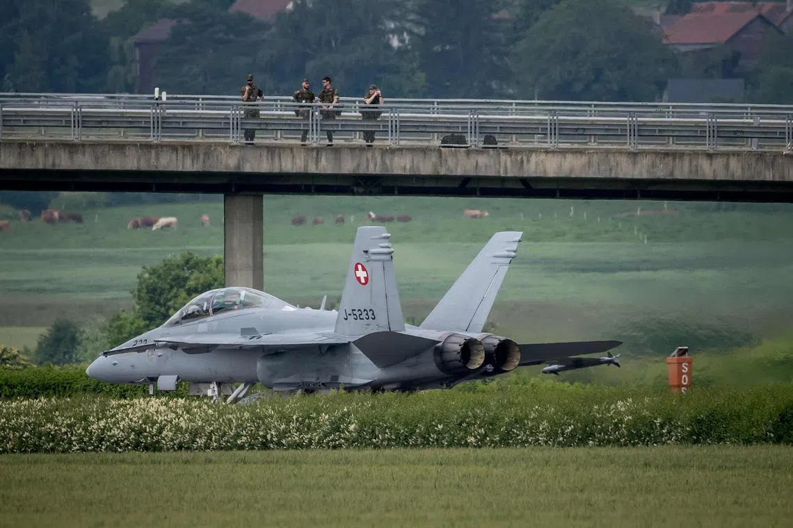 A handful of onlookers and emergency services watched the twin-engine supersonic jets touch down on a closed-off stretch of the A1 motorway.