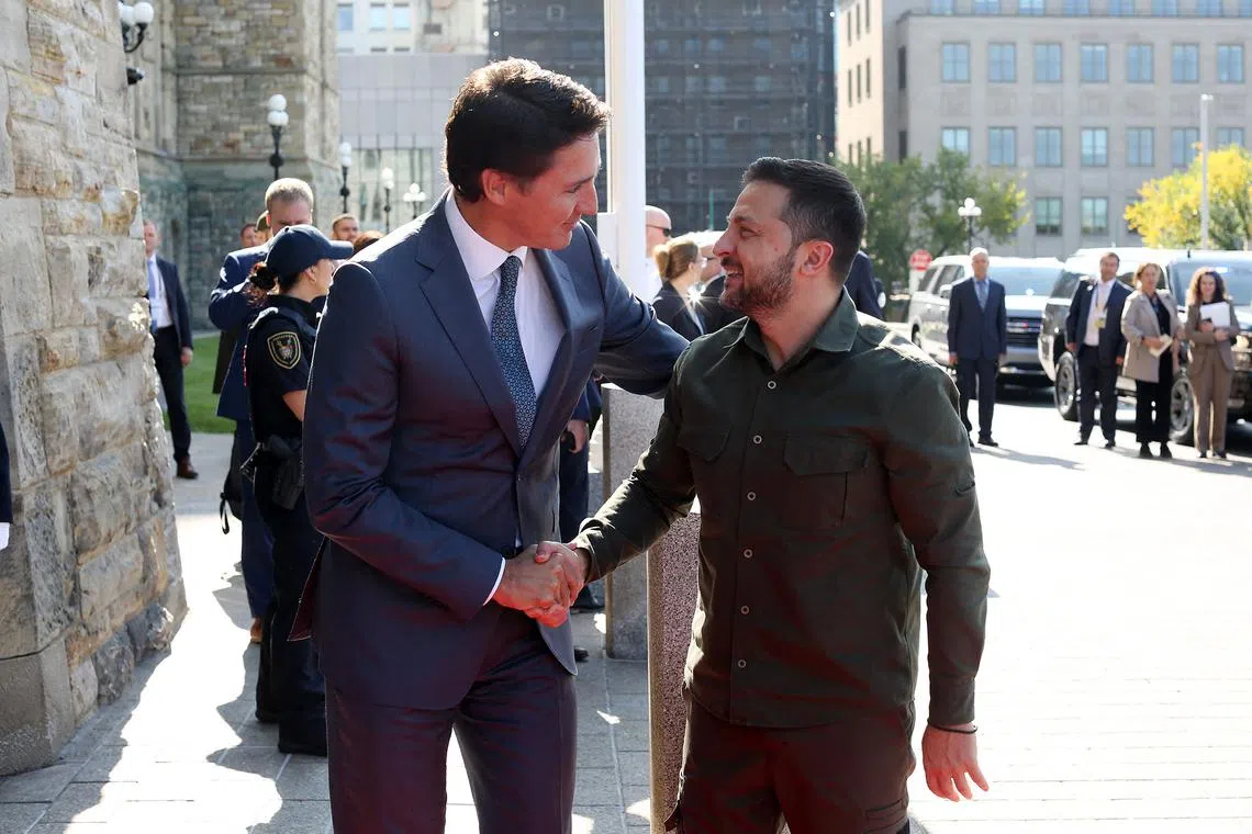 Canadian Prime Minister Justin Trudeau welcomes Ukrainian President Volodymyr Zelensky at Parliament Hill in Ottawa.