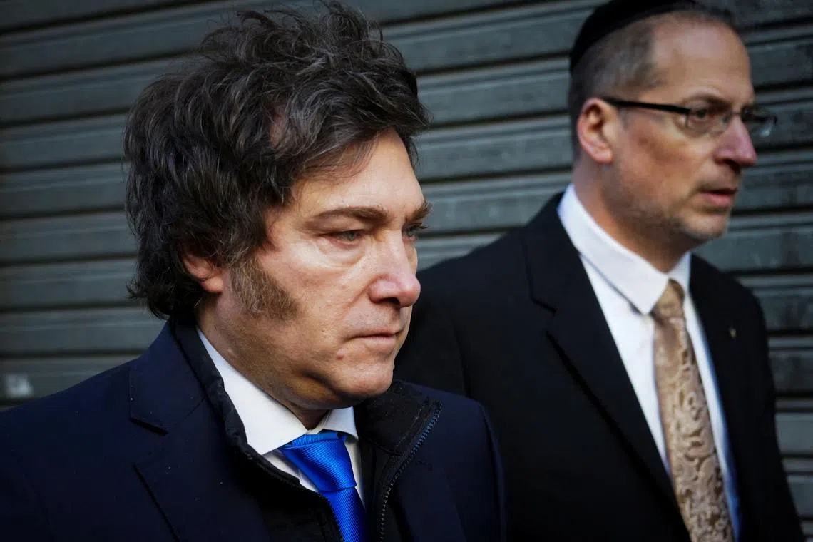 FILE PHOTO: Argentina's President Javier Milei attends an event marking the 31st anniversary of the 1994 bombing attack on the Argentine Israelite Mutual Association (AMIA) community centre, in Buenos Aires, Argentina July 18, 2025. REUTERS/Mariana Nedelcu/File Photo