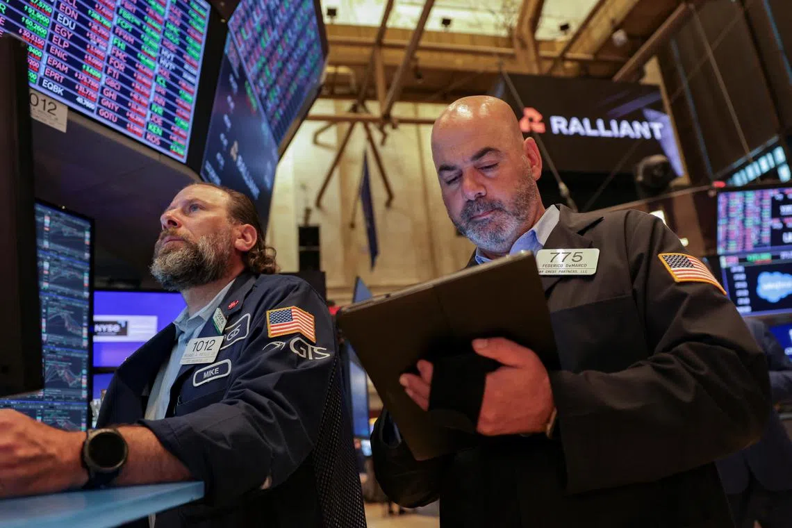 Traders working on the floor of the New York Stock Exchange, in New York City, on July 1.
