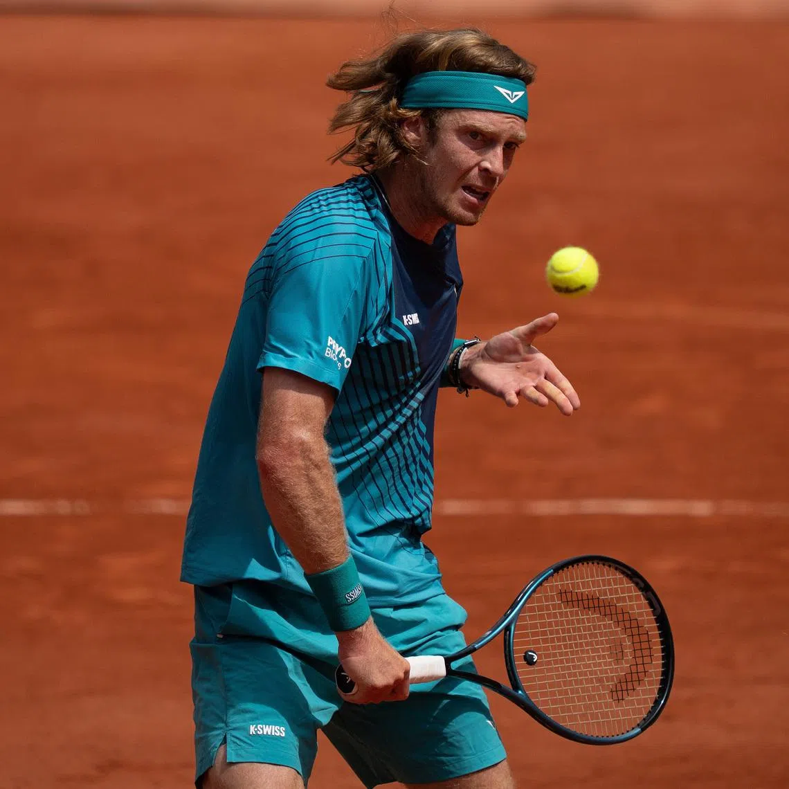 May 29, 2026; Paris, France; Andrey Rublev returns a shot during his match against Nuno Borges of Portugal on day six at Stade Roland Garros. Mandatory Credit: Susan Mullane-Imagn Images
