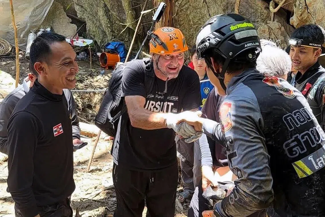 Diver says ‘racing against time’ to rescue 7 trapped in Laos cave