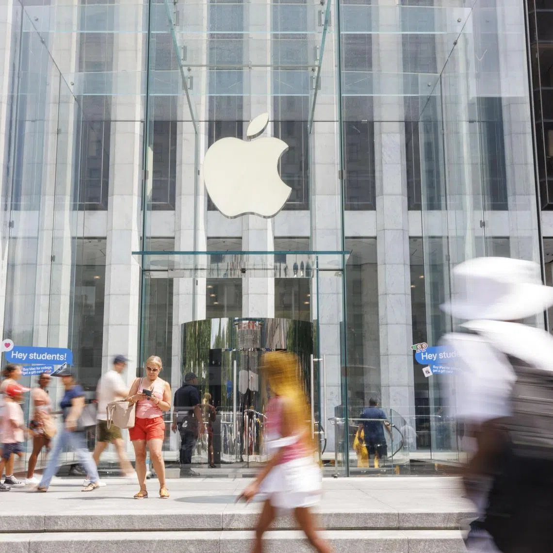 Apple's sales rose 5 per cent in the third quarter, topping estimates as iPad and Services revenues jumped.