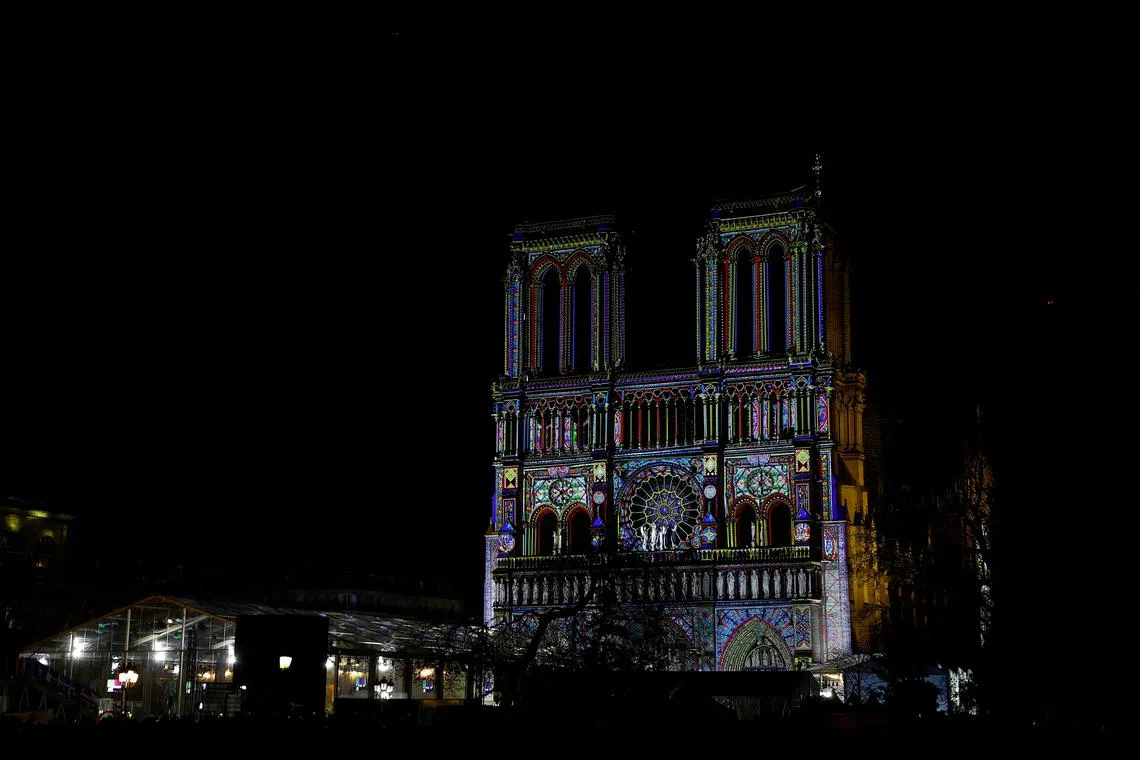 View of a light show rehearsal on the facade of the Notre-Dame de Paris Cathedral, five-and-a-half years after a fire ravaged the Gothic masterpiece, on the eve of reopening ceremonies in Paris, France, December 6, 2024. REUTERS/Sarah Meyssonnier