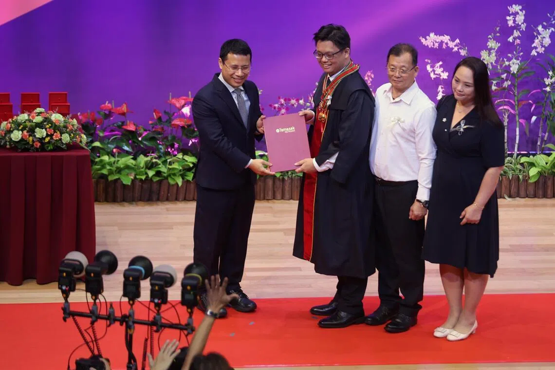 Temasek Polytechnic student Justin How Wei Inn receiving his diploma and the Lee Kwan Yew Award from Minister of Education Desmond Lee during the Temasek Polytechnic Graduation Ceremony on May 8, 2026.