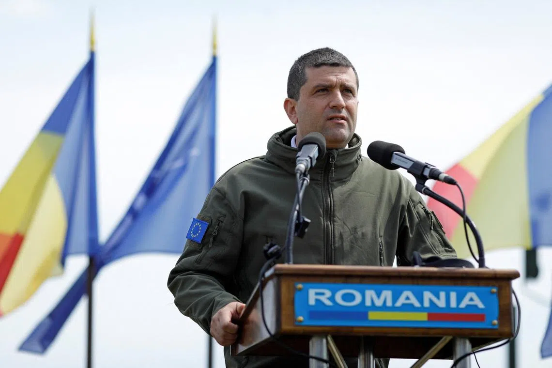 Romanian Defence Minister Radu Miruta delivers a speech during Eastern Phoenix exercise in Capu Midia training range in Constanta county, Romania, April 24, 2026. Inquam Photos/Malina Norocea via REUTERS ATTENTION EDITORS - THIS IMAGE WAS PROVIDED BY A THIRD PARTY. ROMANIA OUT. NO COMMERCIAL OR EDITORIAL SALES IN ROMANIA