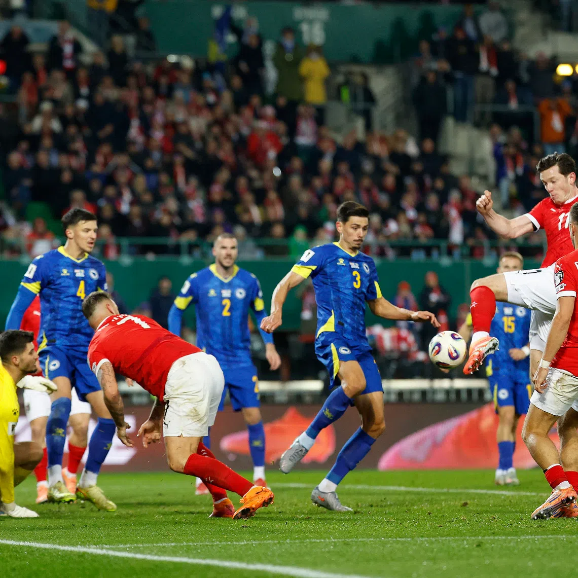 Soccer Football - FIFA World Cup - UEFA Qualifiers - Group H - Austria v Bosnia and Herzegovina - Ernst-Happel-Stadion, Vienna, Austria - November 18, 2025 Austria's Michael Gregoritsch scores their first goal REUTERS/Lisa Leutner