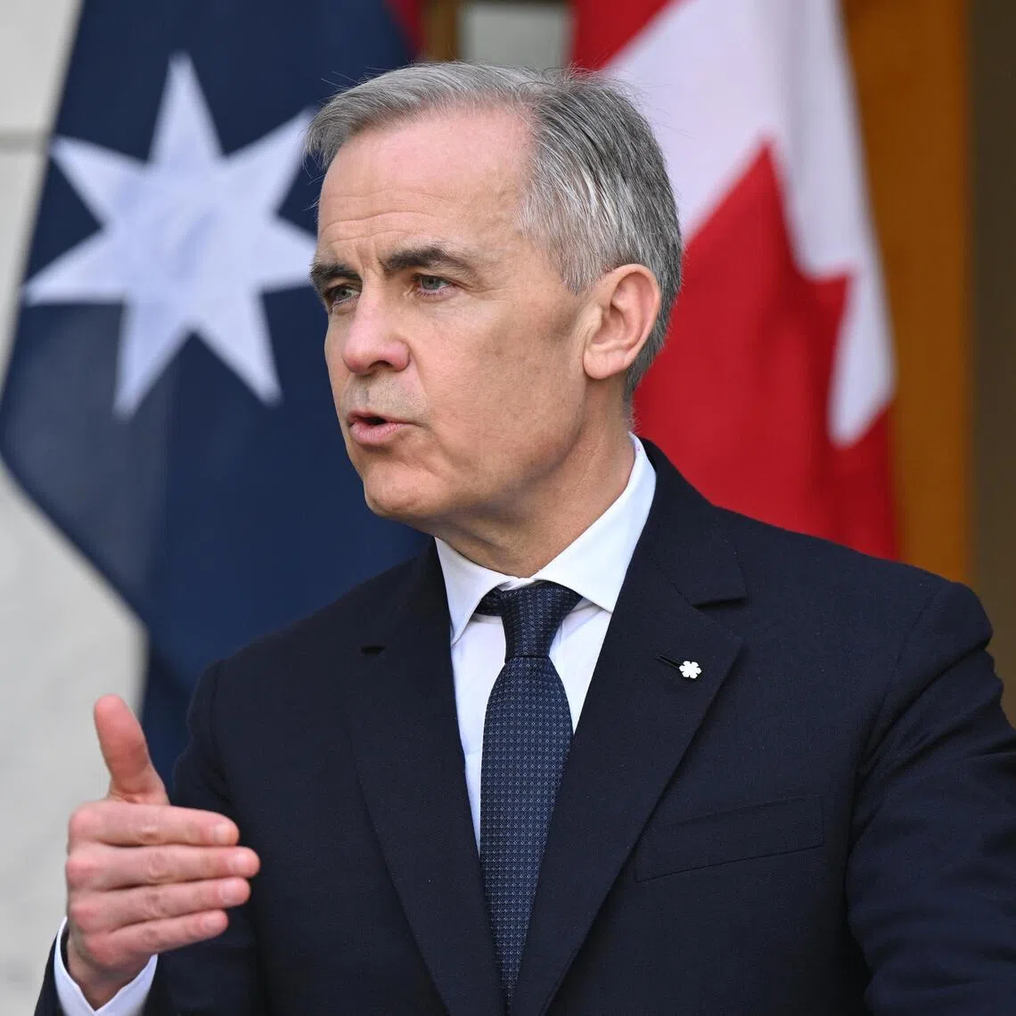 Canadian Prime Minister Mark Carney speaks to the media during a joint press conference with Australian Prime Minister Anthony Albanese at Parliament House in Canberra, Australia, 05 March 2026. 
