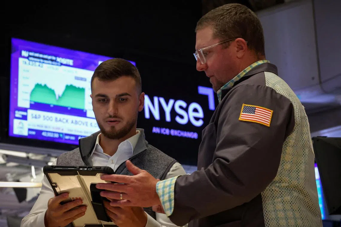 Traders working on the floor of the New York Stock Exchange, in New York City.    