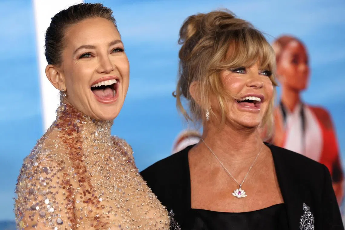 Cast member Kate Hudson and her mother, actress Goldie Hawn, at the premiere for the film Glass Onion: A Knives Out Mystery in Los Angeles on November 14.