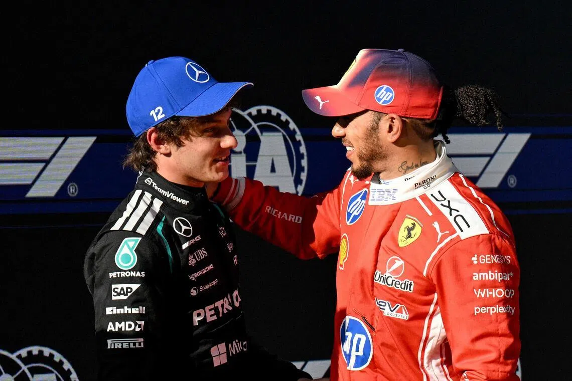 Ferrari driver Lewis Hamilton (right), who placed third in qualifying, congratulates Mercedes' Kimi Antonelli on achieving pole position for the Chinese Grand Prix.