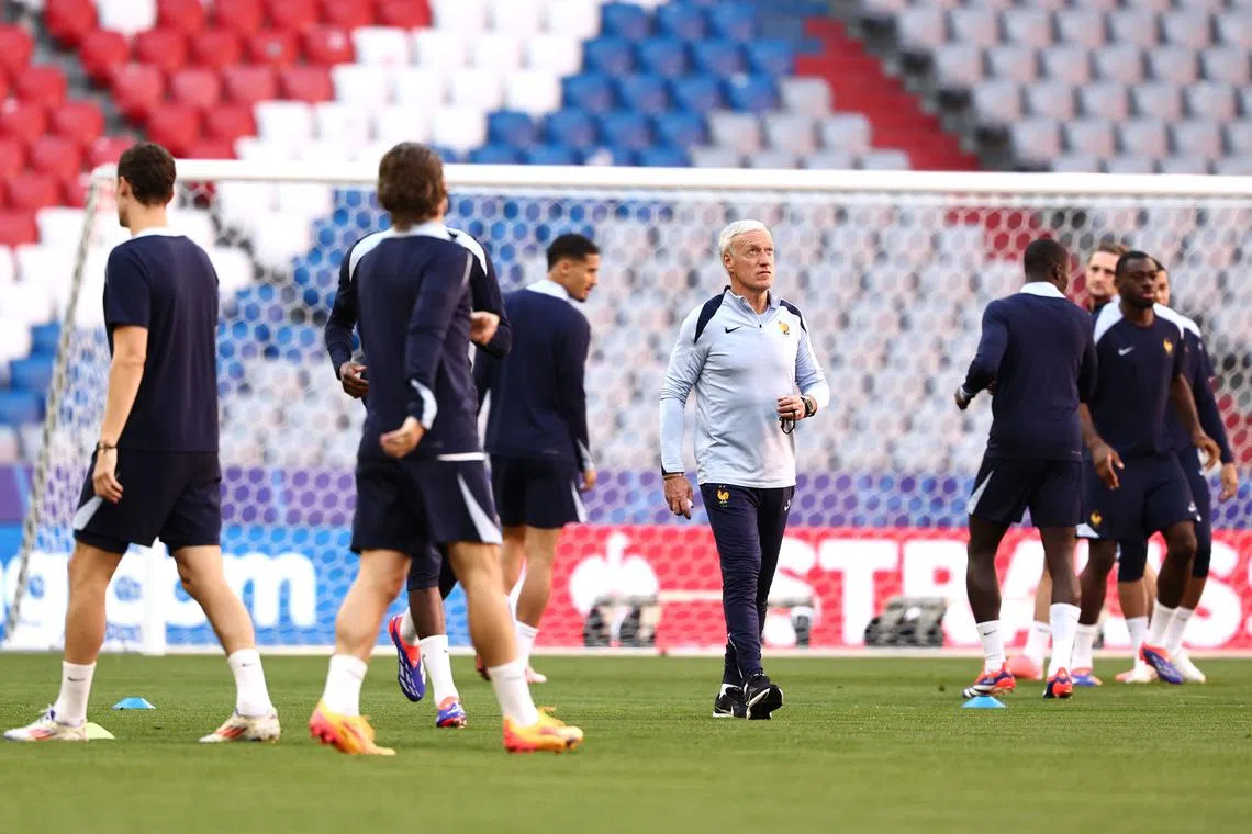 Head coach Didier Deschamps of France attends the team's training session in Munich, Germany.