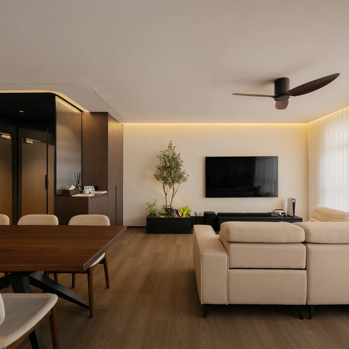 The young couple who own this Tampines flat wanted a modern Japandi interior in American walnut with space to entertain and a flexible layout.