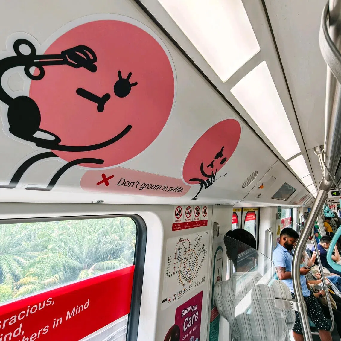 A poster in a train carriage reminds commuters to be gracious while travelling.