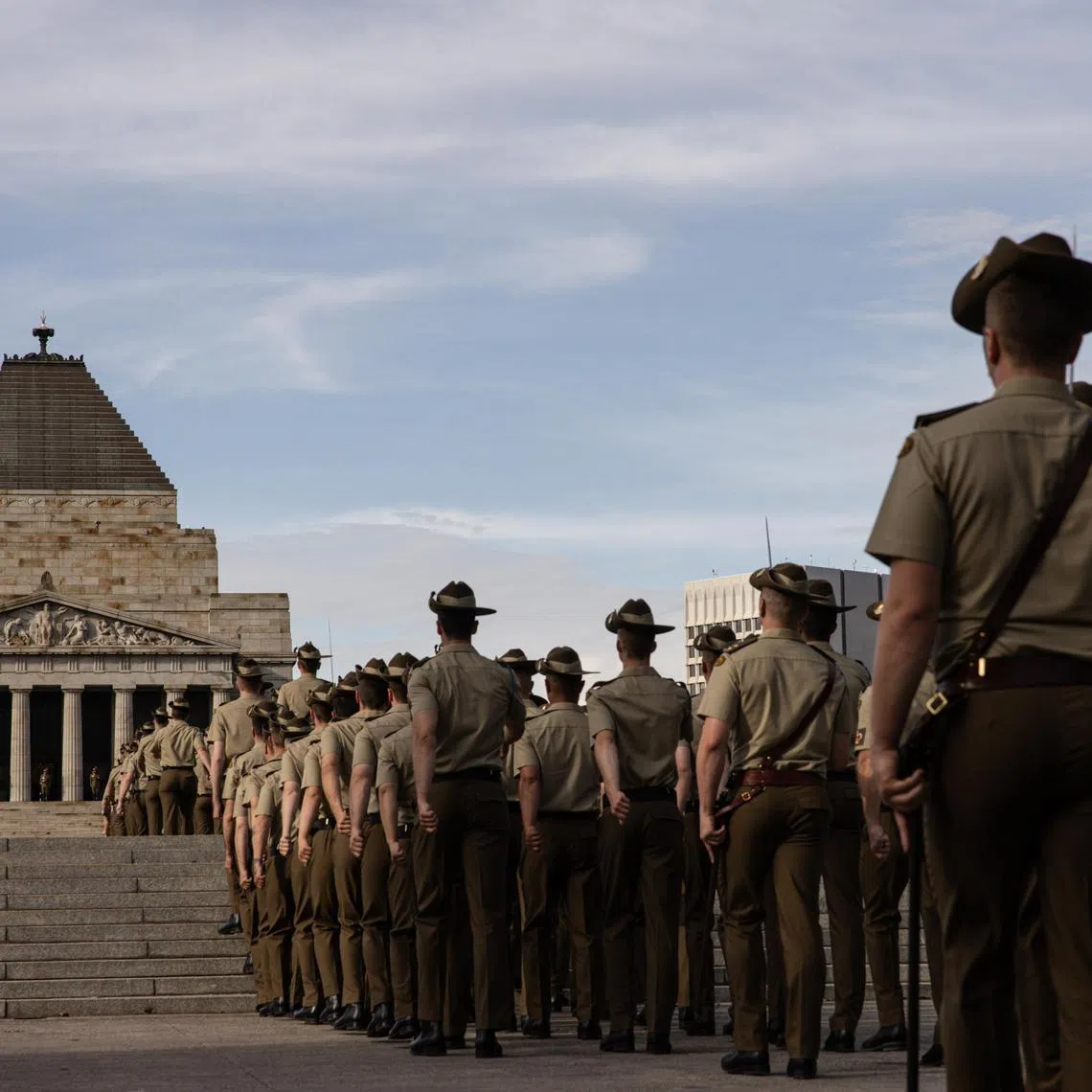 Australian Defence Force (ADF) personnel participate in the Anzac Day March towards the Shrine Of Remembrance in Melbourne, Australia.