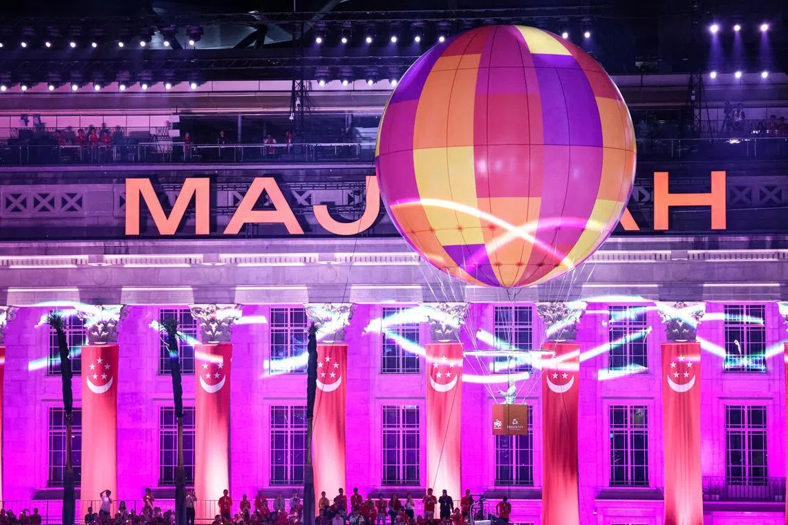 ST20250809_202515600544/pixndp2025/Brian Teo/A helium balloon ferrying singer Dick Lee, signalled the opening of Act Three Our Resilience, Our Spirit at the National Day Parade at the Padang on Aug 9, 2025. ST PHOTO: BRIAN TEO
