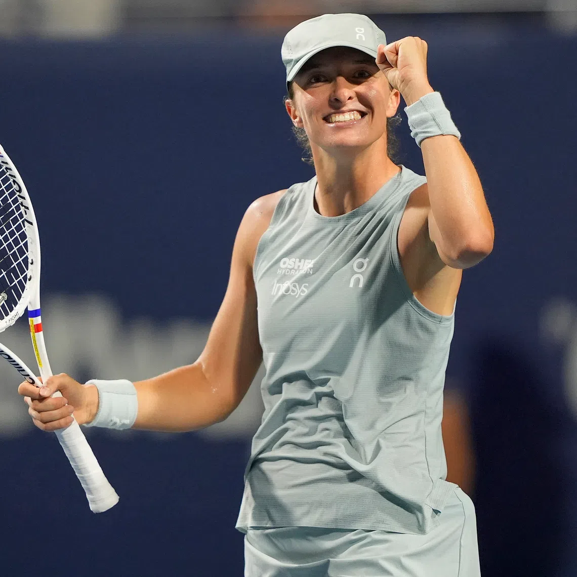 Iga Swiatek celebrates after reaching the Canadian Open final.