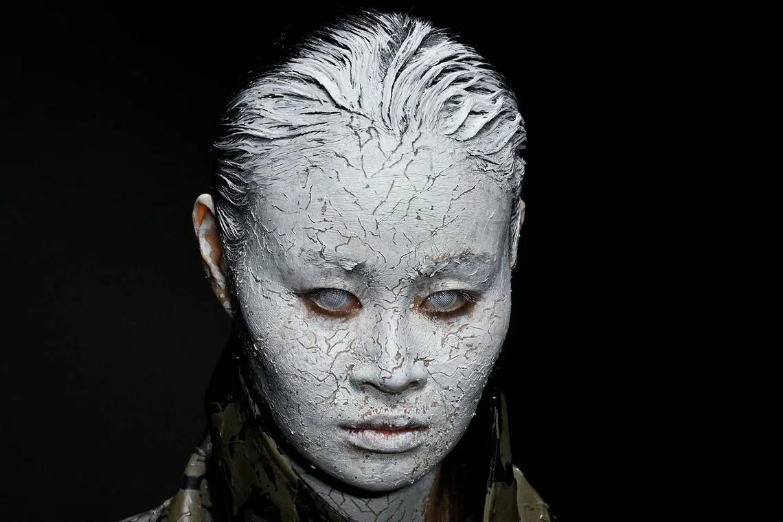 A model displays a creation from the Mi&Go collection by Long Jing during China Fashion week in Beijing on March 27, 2024. 