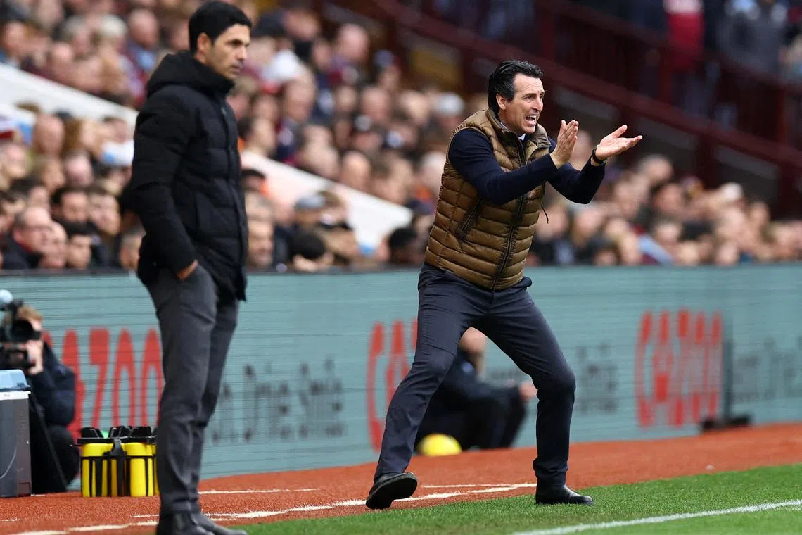 FILE PHOTO: Soccer Football - Premier League - Aston Villa v Arsenal - Villa Park, Birmingham, Britain - February 18, 2023 Aston Villa manager Unai Emery reacts as Arsenal manager Mikel Arteta looks on REUTERS/Hannah Mckay/File Photo