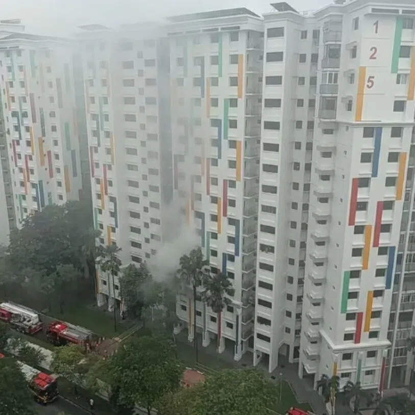 The fire can be seen raging in the bedroom of a third-floor unit.