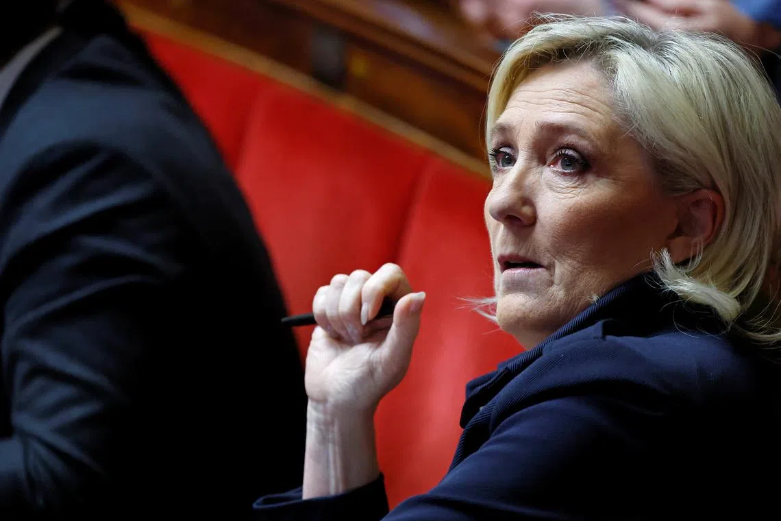 FILE PHOTO: French far-right leader and member of parliament Marine Le Pen, President of the French far-right National Rally (Rassemblement National - RN) party parliamentary group, attends the questions to the government session at the National Assembly in Paris, France, January 28, 2025.  REUTERS/Gonzalo Fuentes/File Photo