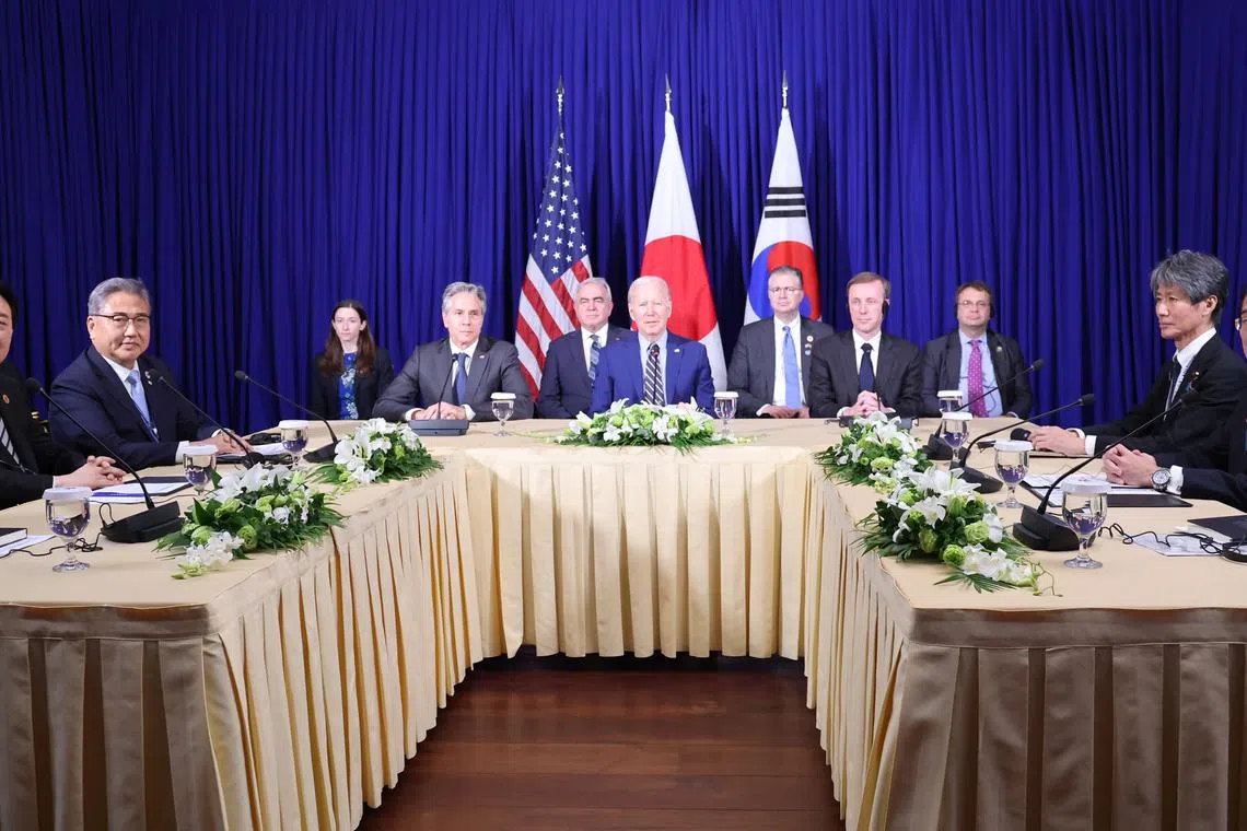 South Korean President Yoon Suk-yeol (left), US President Joe Biden (centre) and Japanese Prime Minister Fumio Kishida (right) during their meeting in Phnom Penh on Nov 13, 2022.