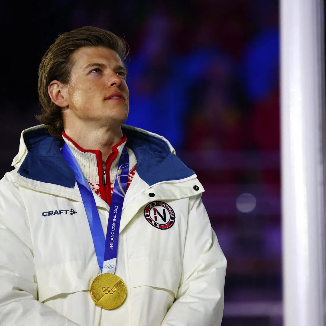 FILE PHOTO: Milano Cortina 2026 Olympics - Cross-Country Skiing - Men's 50km Mass Start Classic Victory Ceremony - Verona Olympic Arena, Verona, Italy - February 22, 2026. Gold medallist Johannes Hoesflot Klaebo of Norway celebrates on the podium after winning the Men's 50km Mass Start Classic REUTERS/Guglielmo Mangiapane/File Photo