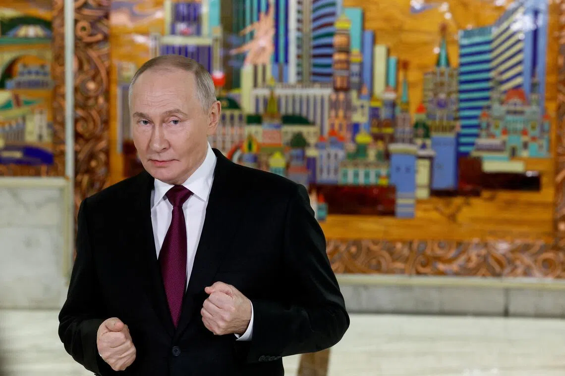 Russian President Vladimir Putin speaks with journalists as he attends the VTB Investment Forum "Russia Calling!" in Moscow, Russia, December 2, 2025. Sergei Ilnitsky/Pool via REUTERS