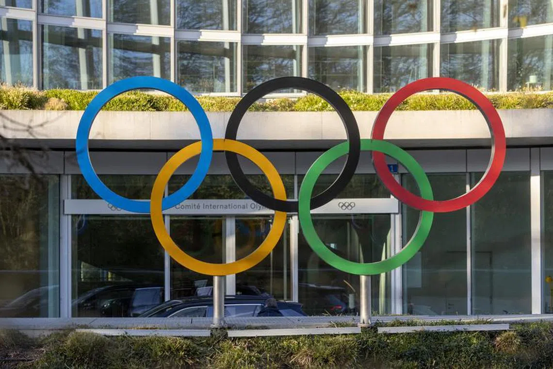 FILE PHOTO: A view shows the Olympic Rings in front of the Olympic House, headquarters of the International Olympic Committee (IOC), during the executive board meeting of the International Olympic Committee (IOC), in Lausanne, Switzerland, March 28, 2023. REUTERS/Denis Balibouse