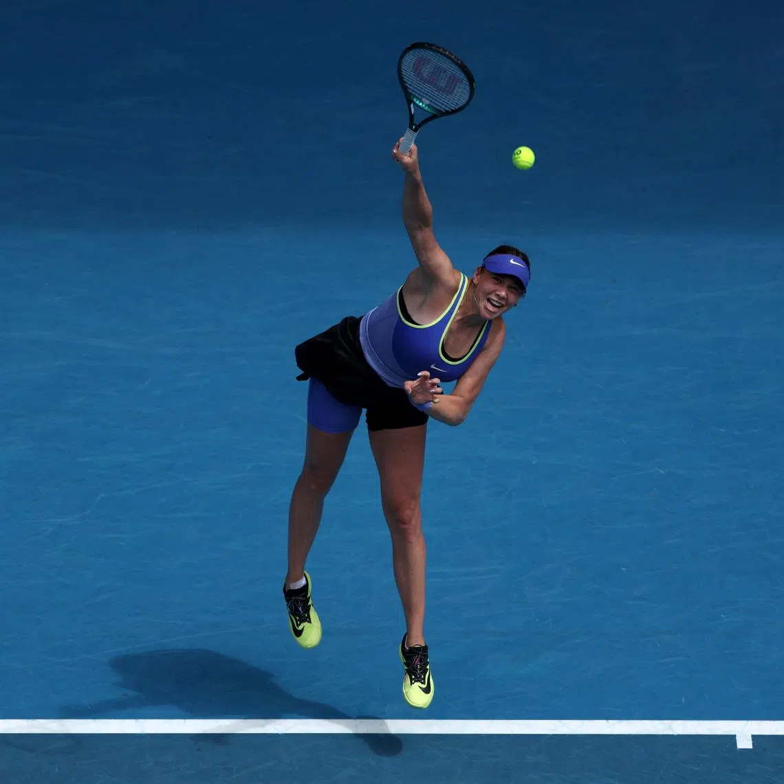 Tennis - Australian Open - Melbourne Park, Melbourne, Australia - January 28, 2026 Amanda Anisimova of the U.S. in action during her quarter final match against Jessica Pegula of the U.S. REUTERS/Edgar Su