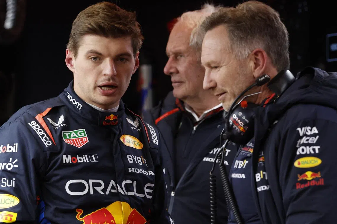 FILE PHOTO: Formula One F1 - Las Vegas Grand Prix - Las Vegas Strip Circuit, Las Vegas, Nevada, United States - November 22, 2024 Red Bull's Max Verstappen talks to Red Bull Team Principal Christian Horner after practice REUTERS/Evelyn Hockstein/File Photo