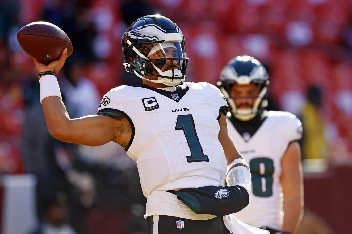 Dec 22, 2024; Landover, Maryland, USA; Philadelphia Eagles quarterback Jalen Hurts (1) warms up before the game against the Washington Commanders at Northwest Stadium. Mandatory Credit: Peter Casey-Imagn Images/ File Photo