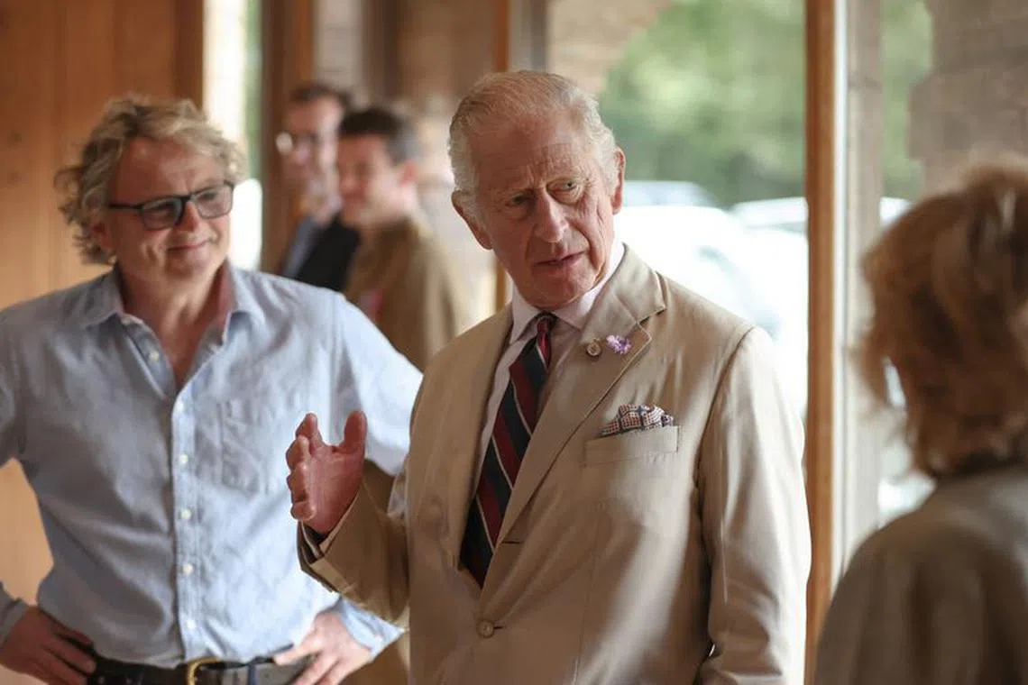 Britain's King Charles III speaks with staff at the Poacher Cheese Farm during his visit to Lincolnshire on July 24, 2023 in Ulceby, Britain. Cameron Smith/Pool via REUTERS/File Photo