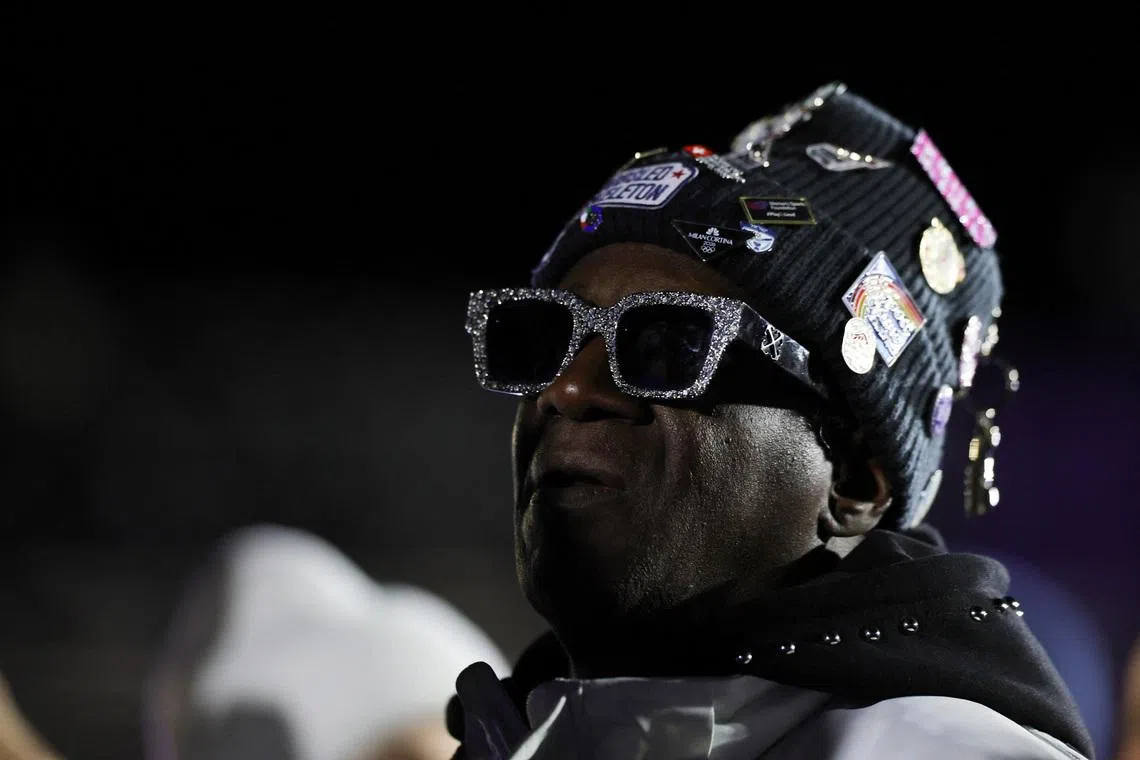 Milano Cortina 2026 Olympics - Bobsleigh - Women's Monobob Victory Ceremony - Cortina Sliding Centre, Cortina d'Ampezzo, Italy - February 16, 2026. Rapper Flavor Flav watches the victory ceremony. REUTERS/Athit Perawongmetha/File Photo