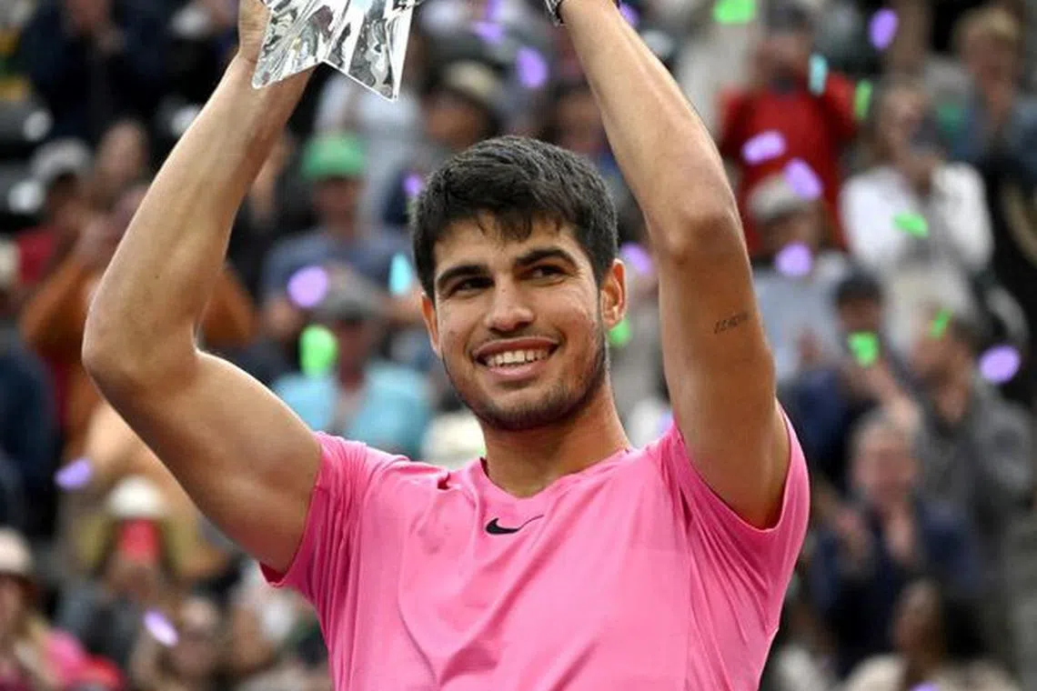Mar 19, 2023; Indian Wells, CA, USA;  Carlos Alcaraz (ESP) holds the championship trophy after defeating Daniil Medvedev (RUS) in the men’s final of the BNP Paribas Open at the Indian Wells Tennis Garden. Mandatory Credit: Jayne Kamin-Oncea-USA TODAY Sports/ File photo