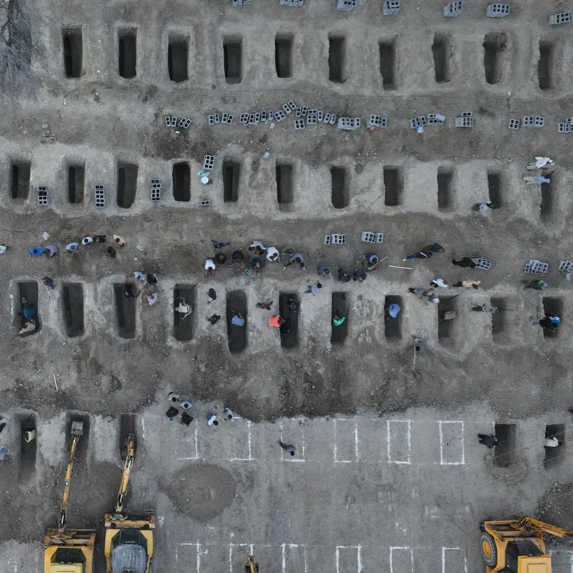 Graves are being prepared for the victims following an Israeli strike on a school in Minab, Iran, March 2, 2026. Iranian Foreign Media Department/WANA (West Asia News Agency)/Handout via REUTERS