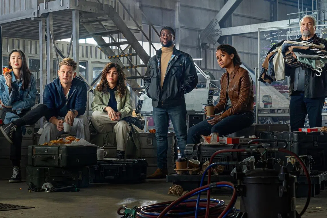 (From left) Kim Yoon-ji, Billy Magnussen, Ursula Corbero, Kevin Hart, Gugu Mbatha-Raw and Vincent D'Onofrio in Lift.