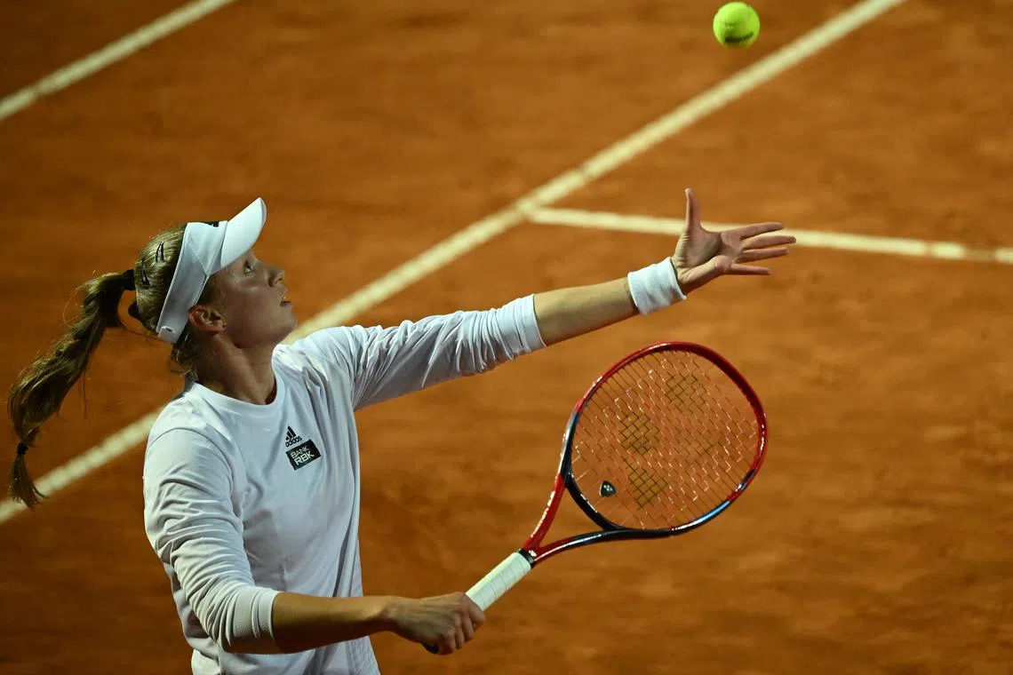 Kazakhstan's Elena Rybakina serves to Ukraine's Anhelina Kalinina during their final match.