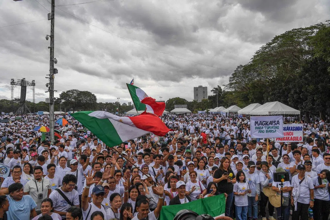 Members of the influential sect Iglesia ni Cristo attend a rally to oppose calls to unseat Vice-President Sara Duterte.