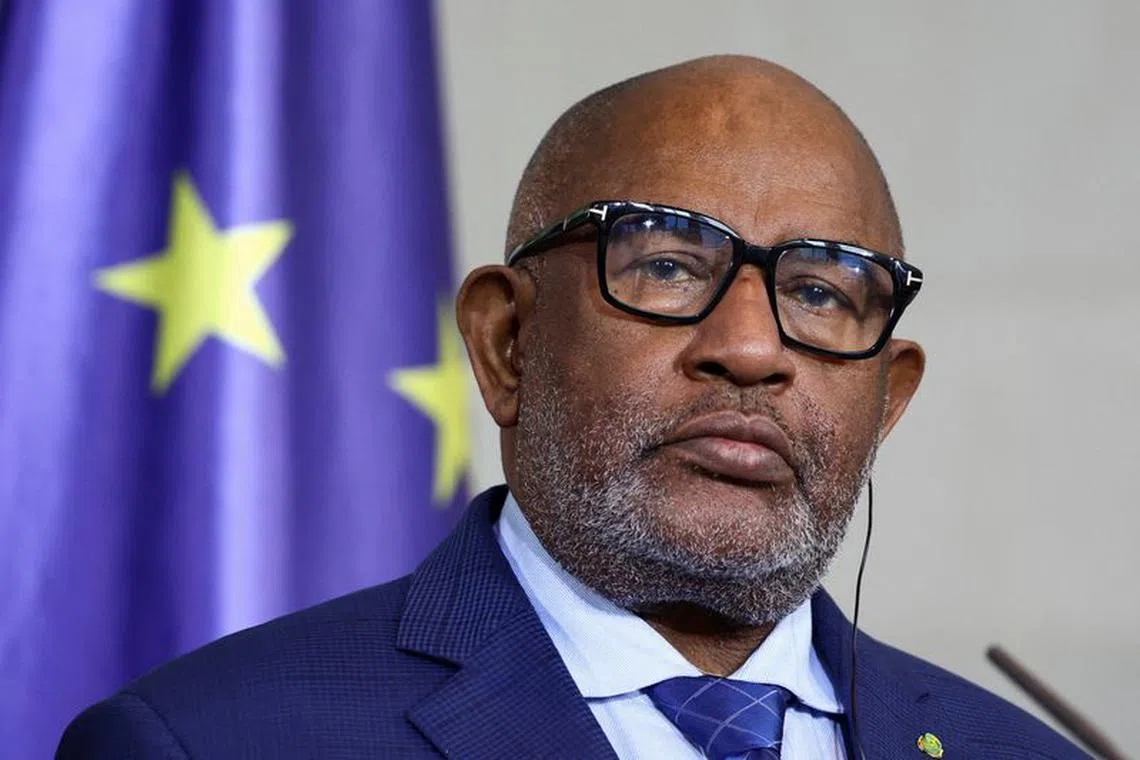 FILE PHOTO: Chairperson of the African Union and Comorian President Azali Assoumani attends a press conference during the \"Compact with Africa\" investment summit in Berlin, Germany, November 20, 2023.  REUTERS/Liesa Johannssen/File Photo