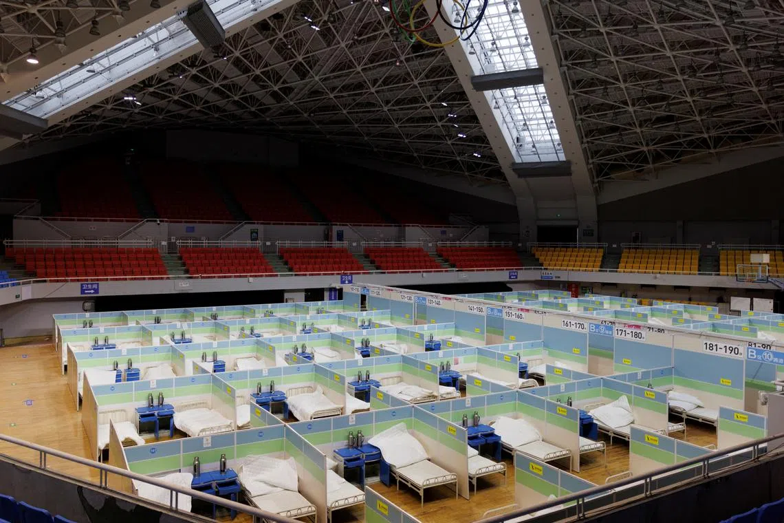 Beds are seen in a fever clinic that was set up in a sports area in Beijing on Dec 20, 2022.