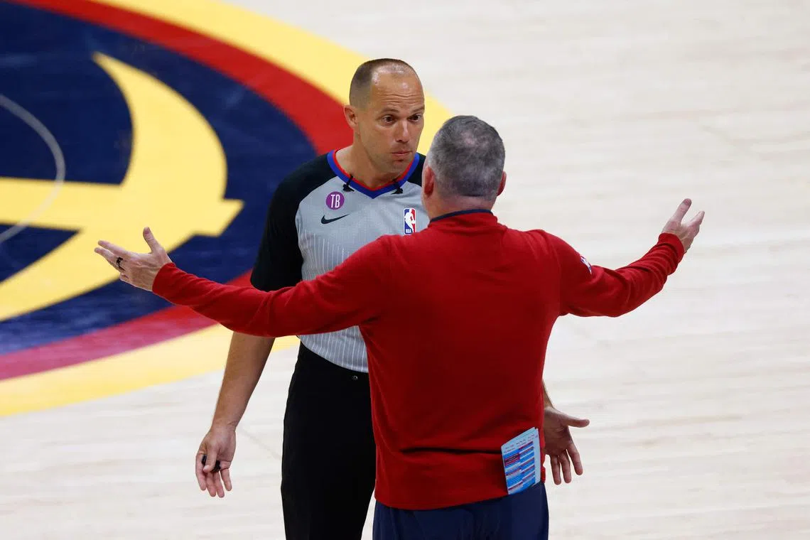 National Basketball Association referees will not be required to stop play to call a flopping violation under new rules for next season.