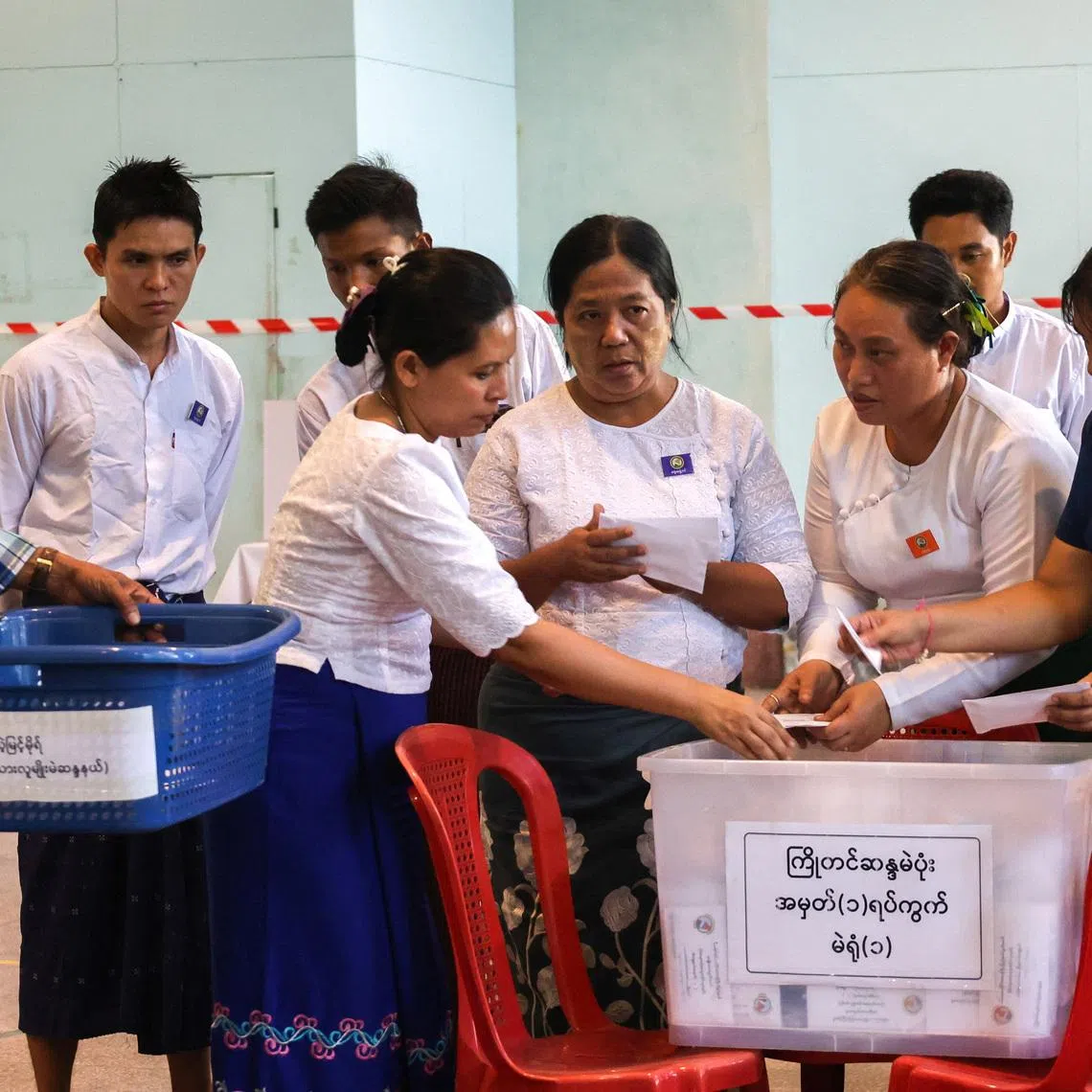 Election Commission officials count ballots at a polling station during Myanmar's general election in Yangon, Myanmar, December 28, 2025. REUTERS/Stringer