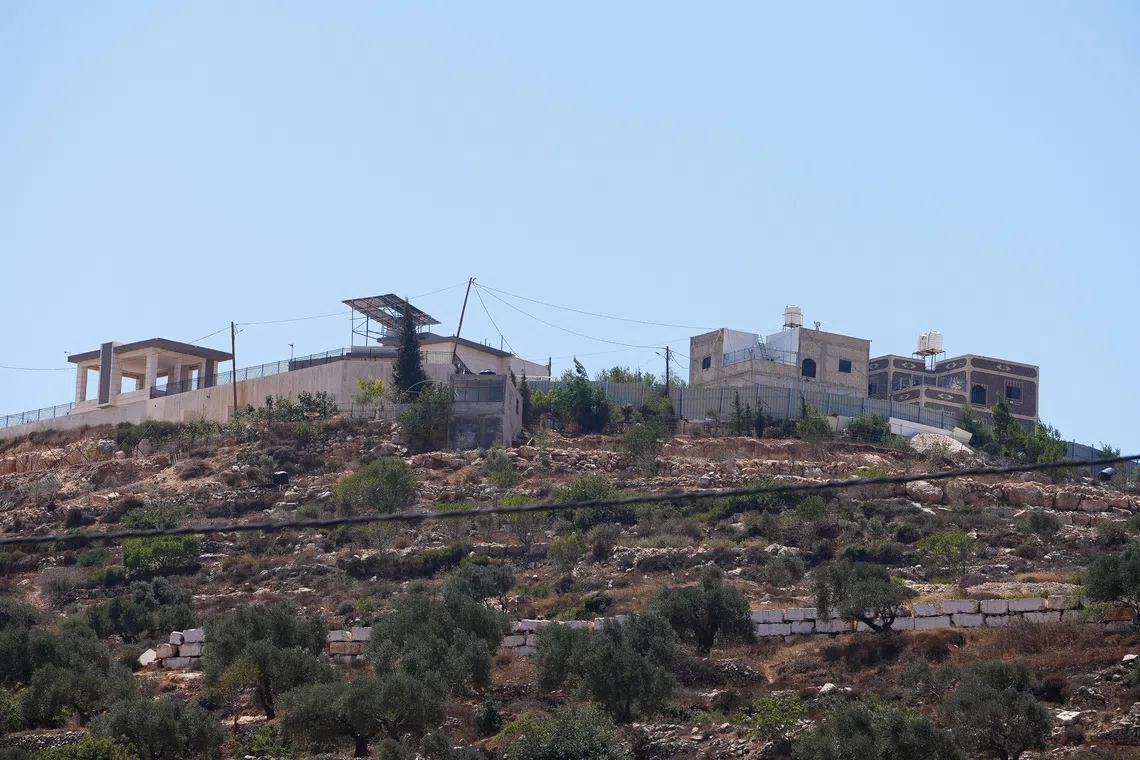 Israel sends troops into West Bank homes besieged by Jewish settlers