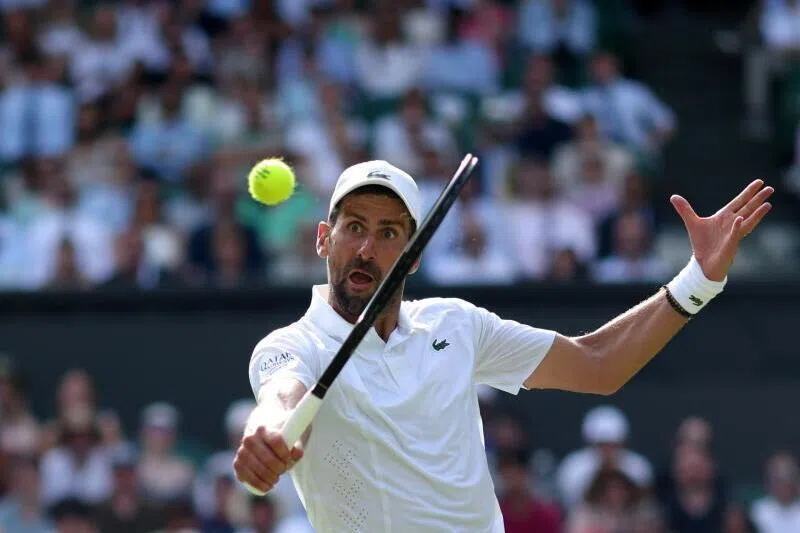 Novak Djokovic in action against Roman Safiullin of Russia at the Wimbledon Championships on July 5 in London.